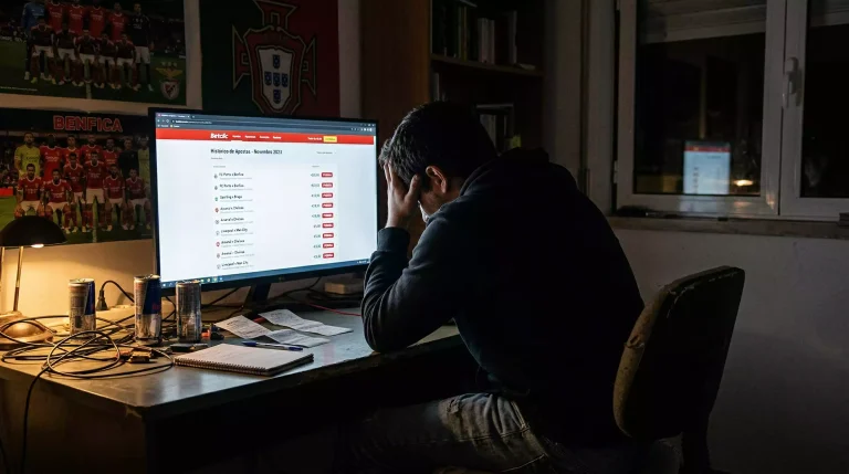 Apostador a analisar erros em histórico de apostas UFC